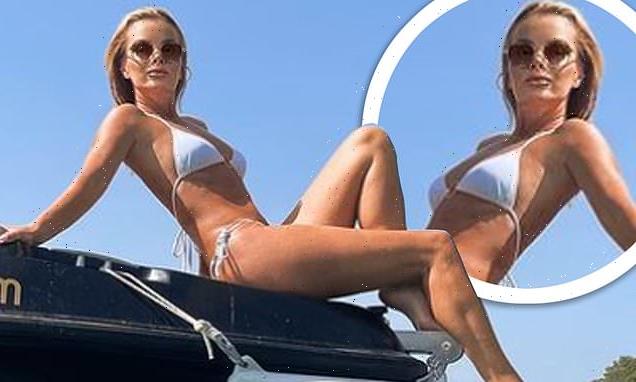 Amanda Holden, 50, SIZZLES in tiny white bikini
