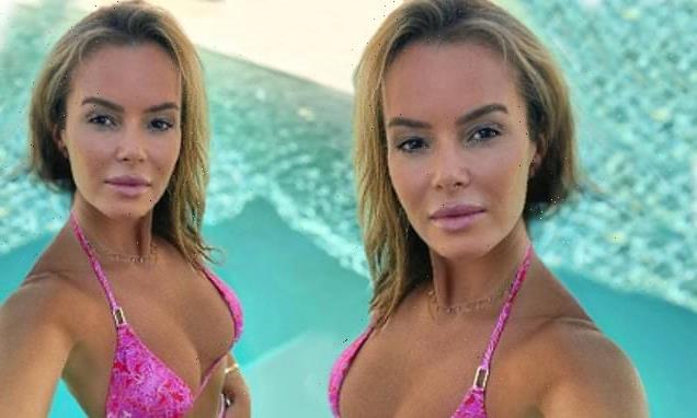 Amanda Holden turns up the temperature in a plunging hot pink bikini