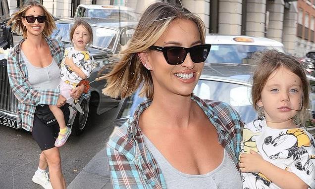 Ferne McCann looks glowing in a checked shirt and lycra shorts