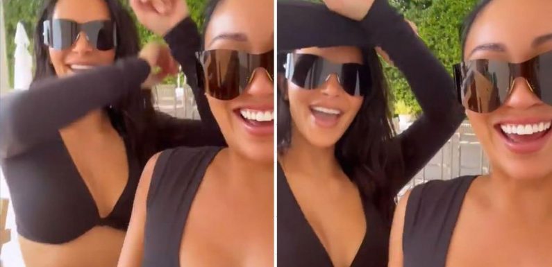 Kim Kardashian dances in sexy black crop top as she joins sister Kourtney & Travis Barker on family's Mexican vacation