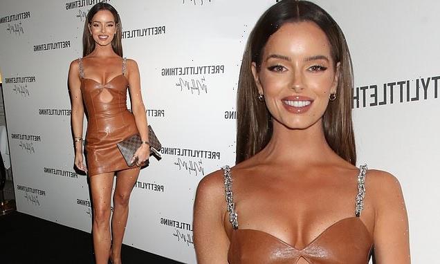 Maura Higgins puts on a leggy display in a cut-out leather dress