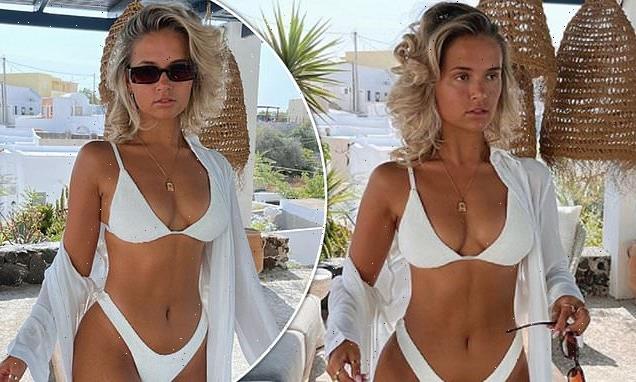 Molly-Mae Hague poses sultrily in a busty off-white bikini on vacation