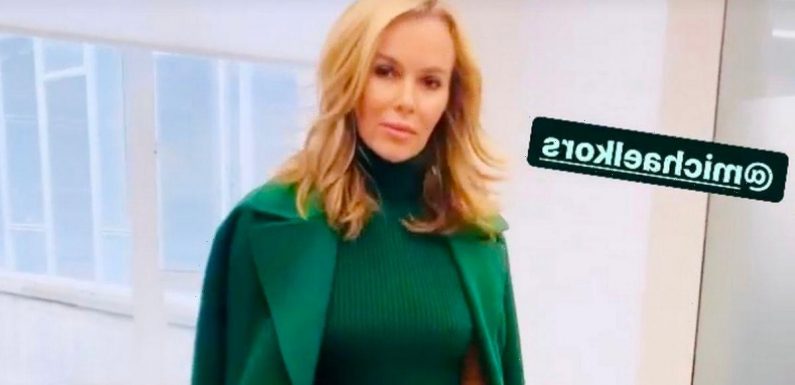 Amanda Holden flaunts ageless beauty as she flashes her torso in paper-thin top