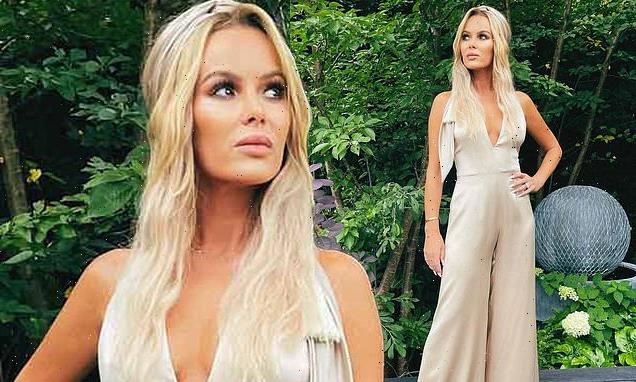 Amanda Holden shows off her physique in plunging gold jumpsuit