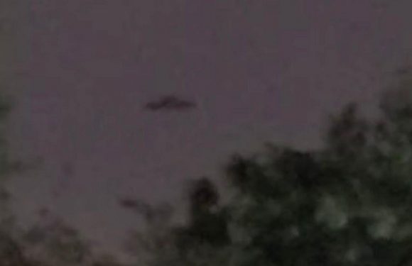 Black ‘saucer-shaped’ object filmed hovering over city sparks conspiracy frenzy