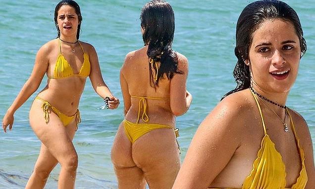 Camila Cabello puts on a very cheeky display in thong bikini
