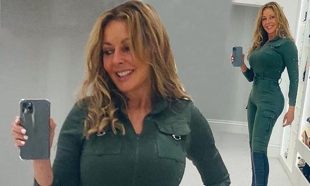 Carol Vorderman, 60, shows off her curves in a khaki boilersuit