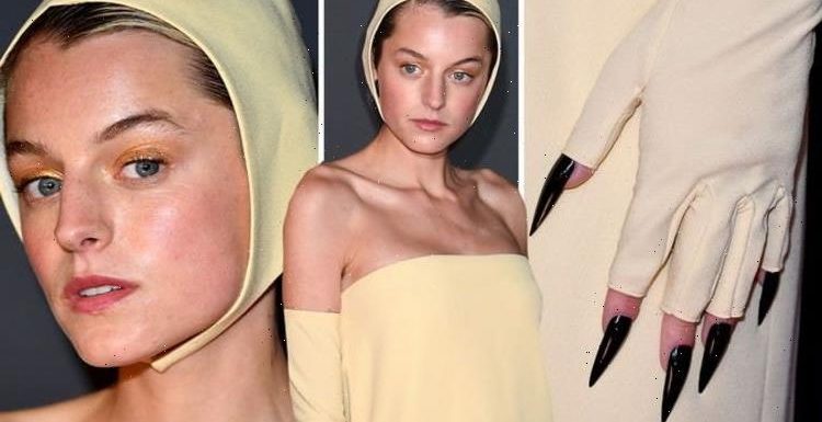 Emma Corrin causes a stir by wearing ‘swimming cap’ and CLAWS to Emmy Awards 2021