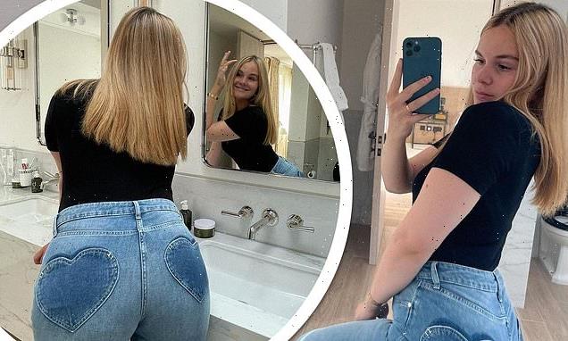 Gordon Ramsay's daughter Holly shows off her posterior in jeans