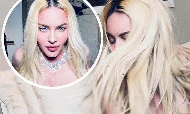 Madonna, 63, puts on vampy display as she goes topless in racy snaps