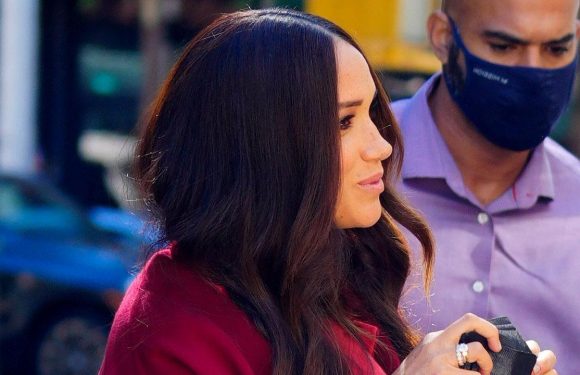 Meghan Markle stuns in scarlet outfit during school visit with Prince Harry