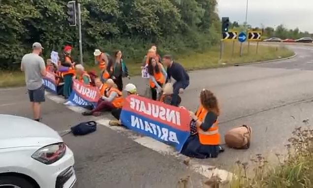 Motorists clash with Insulate Britain climate activists blocking M25