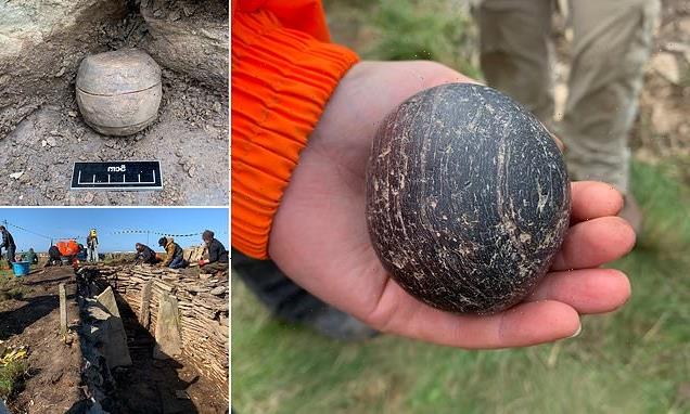 Polished stone balls some 4,000 years old discovered in Orkney tomb