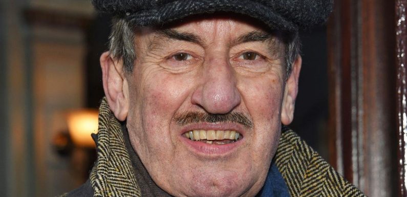 Only Fools’ John Challis laid to rest in eco-coffin with trademark cap on top