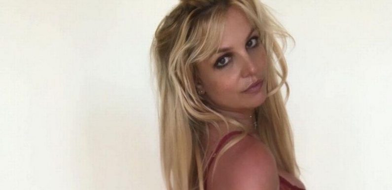 Britney Spears strips to lace lingerie as she says she’s considering third child