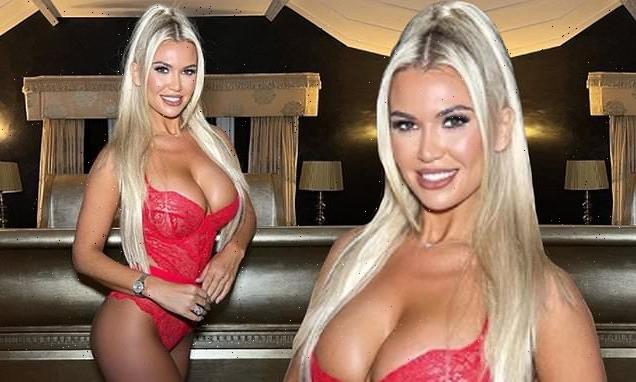 Christine McGuinness flashes her ample assets in red lace lingerie