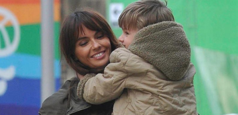 Hollyoaks’ Jennifer Metcalfe beams as she carries son to launch of co-star’s music career