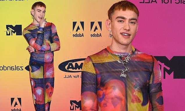 Olly Alexander dons multicoloured maxi dress at MTV EMAs in Budapest