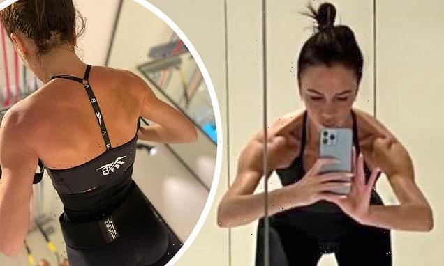 Victoria Beckham shows off toned physique as she works out with David