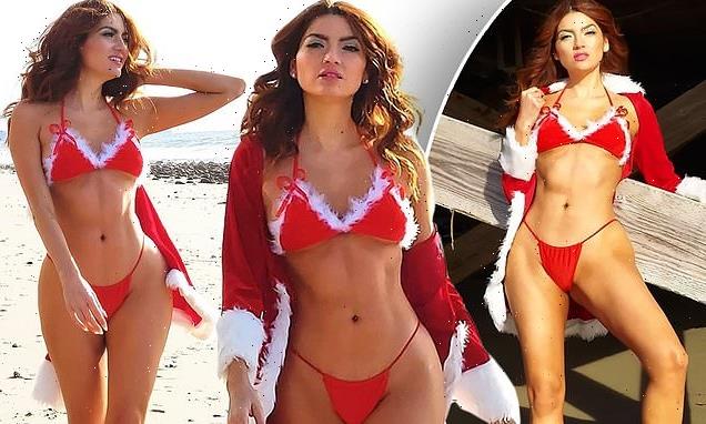Blanca Blanco gets into the holiday spirit by wearing a Santa bikini