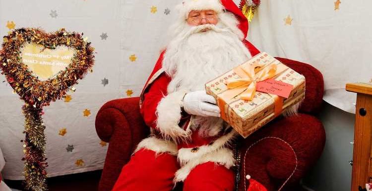 Britain's longest-serving Santa hands out gifts to kids for 59th consecutive year