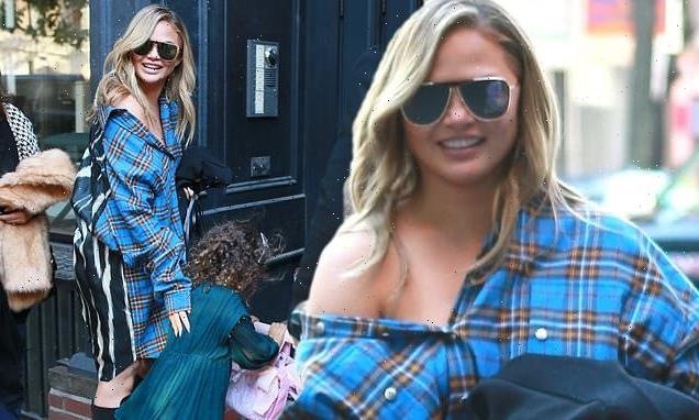 Chrissy Teigen sports off the shoulder flannel dress for lunch outing