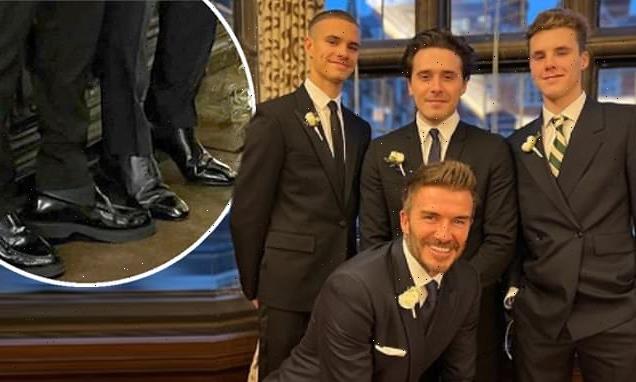 David Beckham crouches down in snap after being caught on his TIPTOES