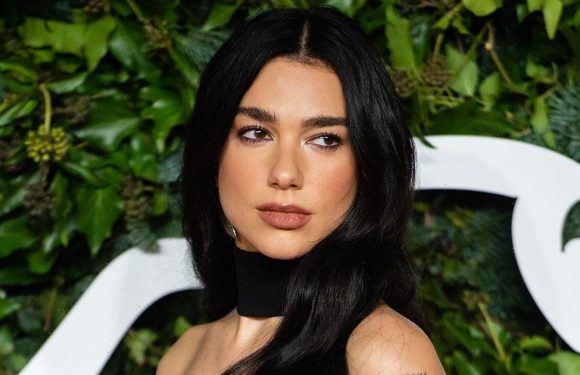 How Dua Lipa Makes a Swimsuit Work in Subzero Temperatures