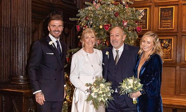 PICTURED: Beaming David Beckham poses with his newlywed father