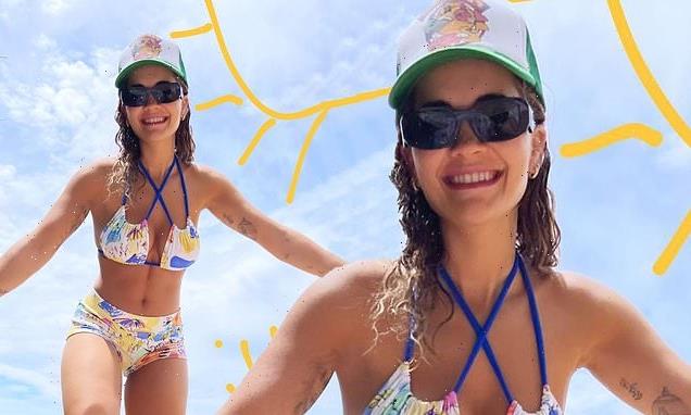 Rita Ora shows off enviable figure in a tiny bikini at a Sydney beach