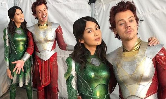 Gemma Chan poses with Harry Styles while on the set of Eternals