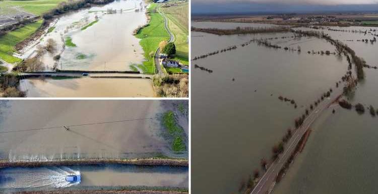 Incredible aerial pics reveal Christmas getaway hell for 18million Brits as floods shut motorways and block railways – The Sun