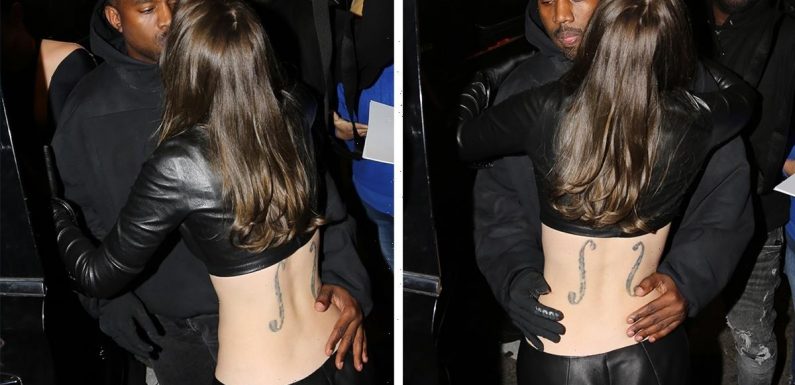 Kanye West's new girl Julia Fox shows off massive back tattoos in VERY low leather pants as she kisses & cuddles rapper