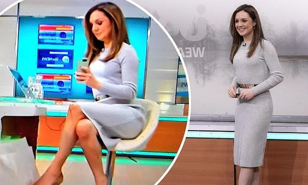Laura Tobin puts on a leggy display in a grey jumper dress