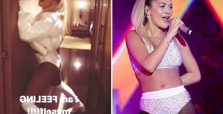 Rita Ora dances in her sparkly underwear in her hotel before wowing fans with a jaw-dropping performance at a concert in Hong Kong