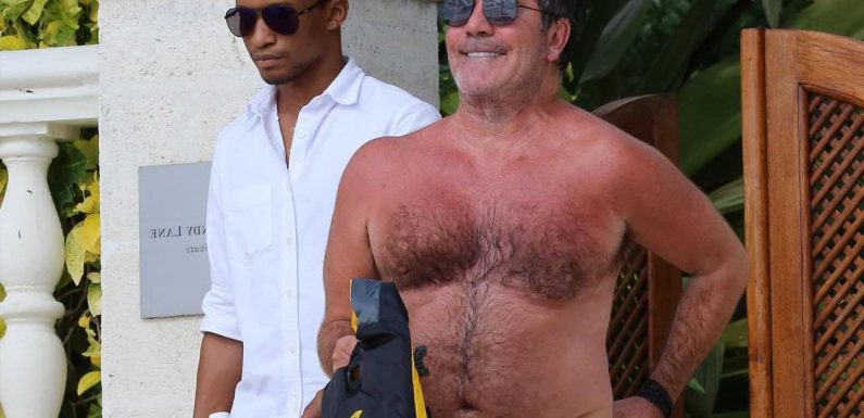 Simon Cowell reveals his sunburned chest as he rides a jetski on luxury holiday in Barbados