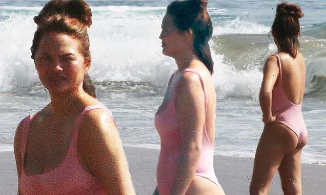 Chrissy Teigen enjoys a beach day after confirming she's doing IVF