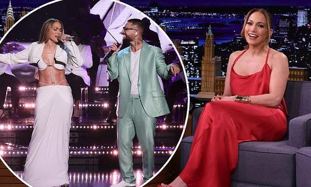 Jennifer Lopez stuns in a fiery red dress on The Tonight Show