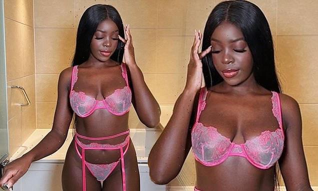 Kaz Kamwi flaunts her incredible figure in three-piece pink lingerie
