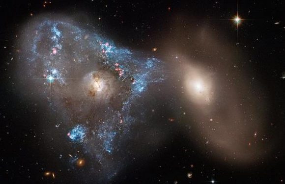 NASA's Hubble captures a SPACE TRIANGLE of star formation