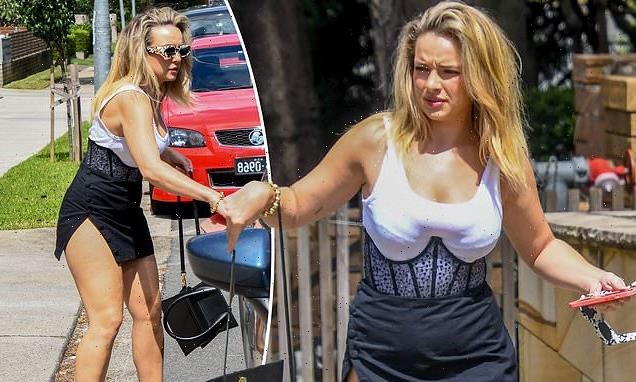 Abbie Chatfield flaunts her curves in corset and mini skirt at Totti's