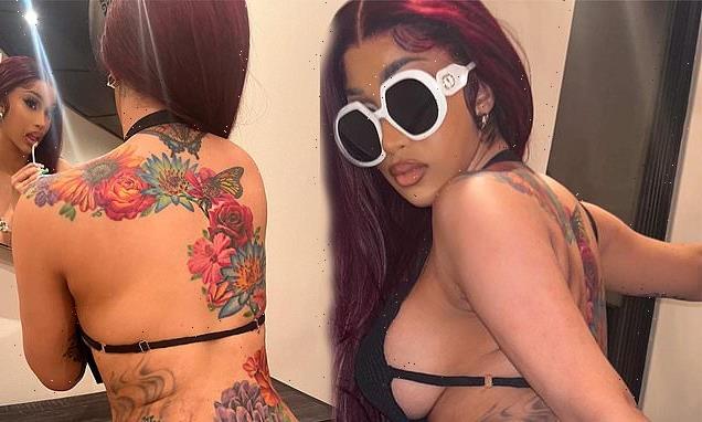 Cardi B showcases back tattoos and side boob in bikini top in new pics