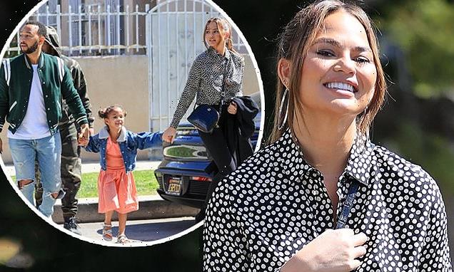 Chrissy Teigen looks as stylish as ever in polka dot blouse