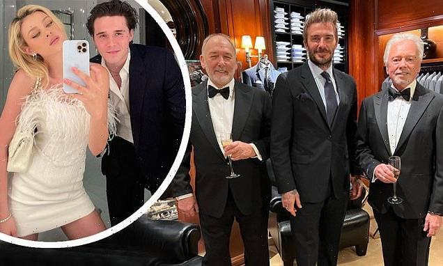David Beckham looks dapper trying on suits ahead of Brooklyn's big day