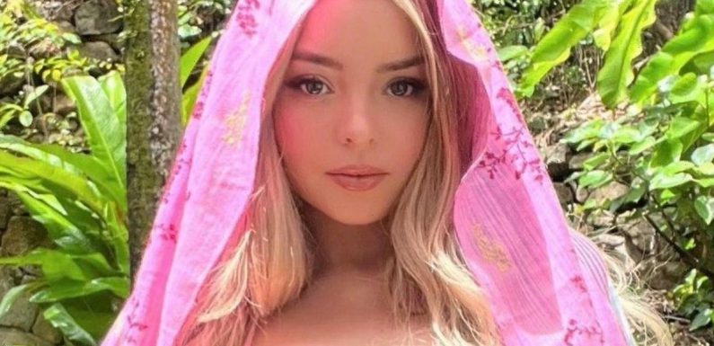 Demi Rose wows fans as she poses in world’s teeniest bikini top for sizzling pic