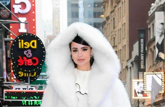 Disney star Sofia Carson cuddles up in enormous snowy white hooded coat, plus more stars in statement outerwear