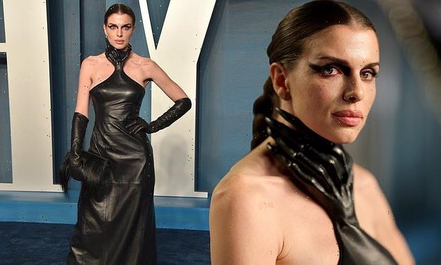 Julia Fox turns heads in leather gown with a HAND around her neck