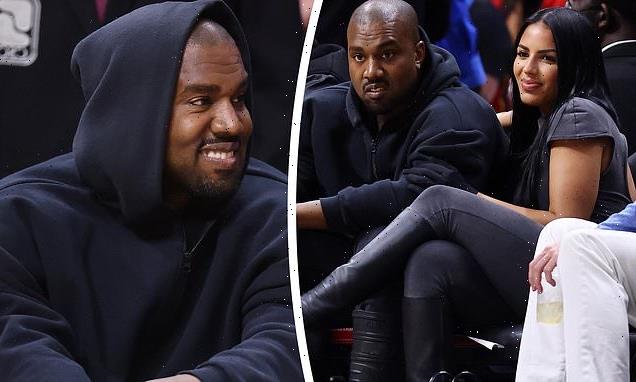 Kanye West and girlfriend Chaney Jones are all smiles at NBA game