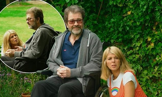 Kate Garraway's frail husband Derek smiles as she creates garden