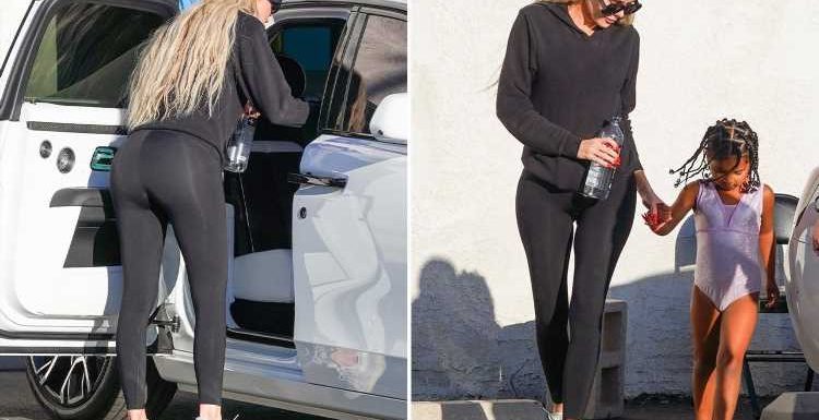 Khloe Kardashian shows off slender frame in skintight pants with daughter True, 3, as fans worry the star is 'too thin'